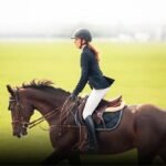Professional farrier trimming a horse hoof efficiently with precision