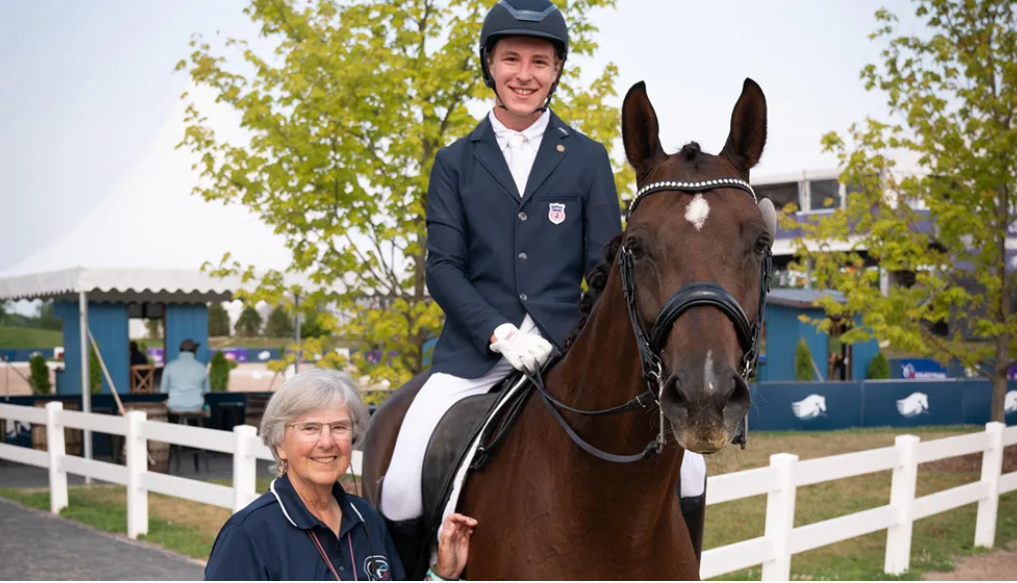 Dressage4Kids youth rider volunteering at equestrian event